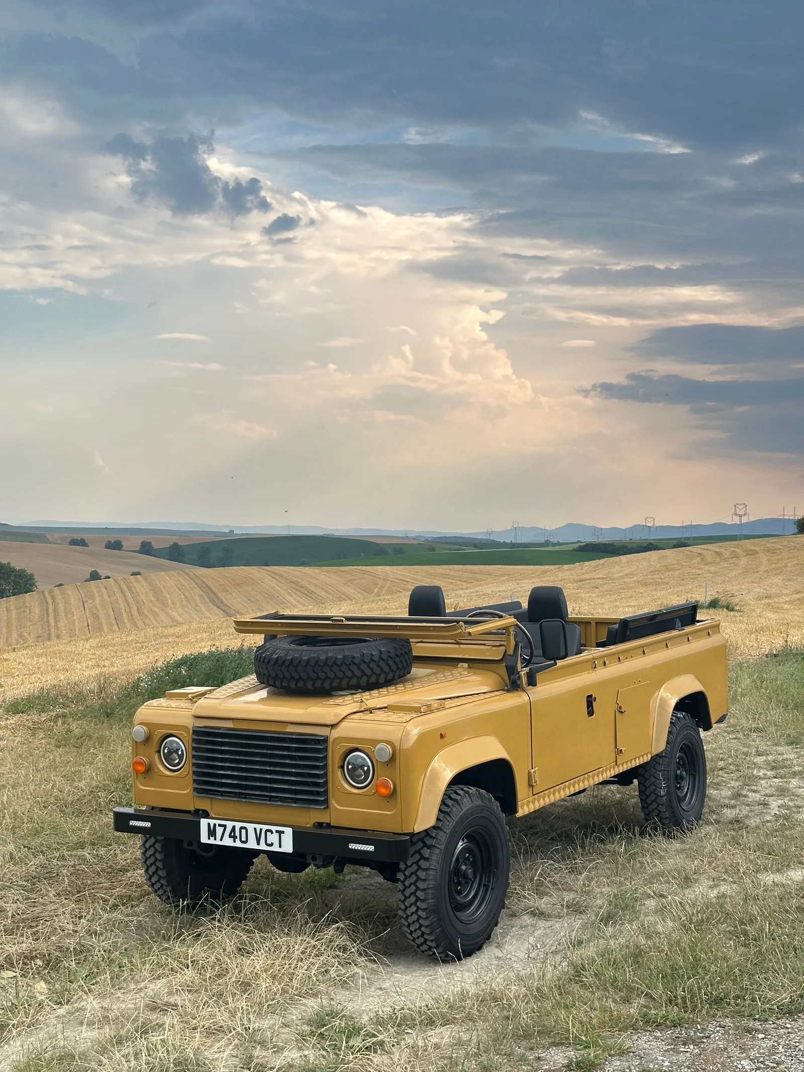 Front view of the Bahama Gold Defender 110 with bonnet-mounted spare wheel