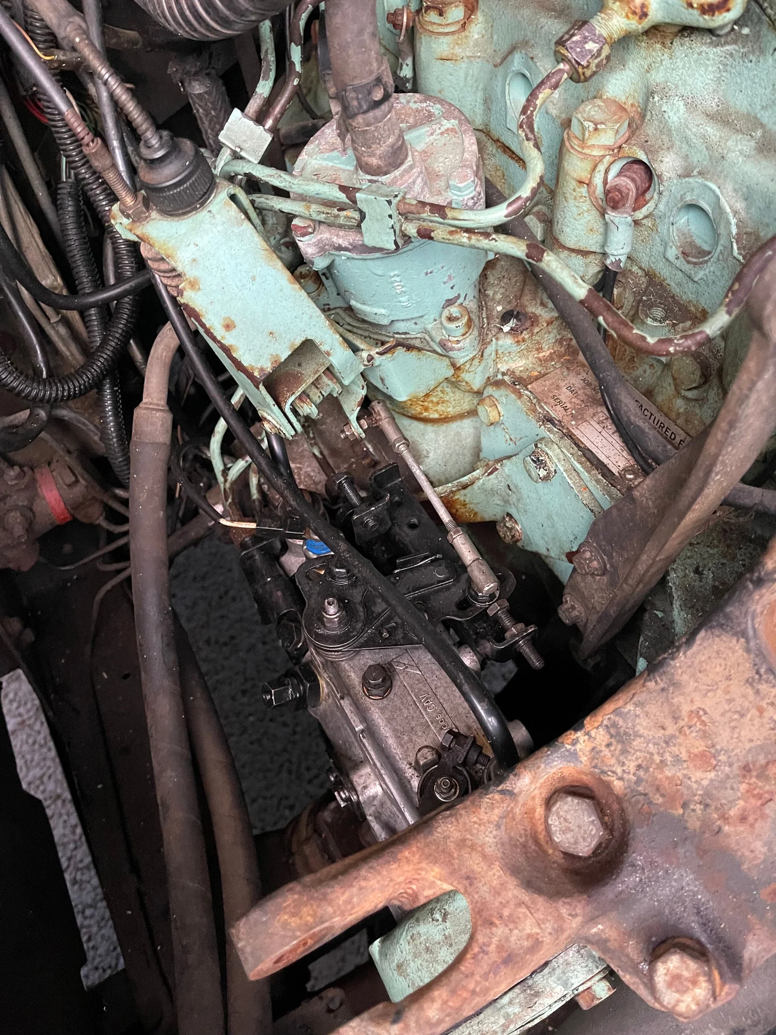 Close-up of the diesel injection pump and engine components